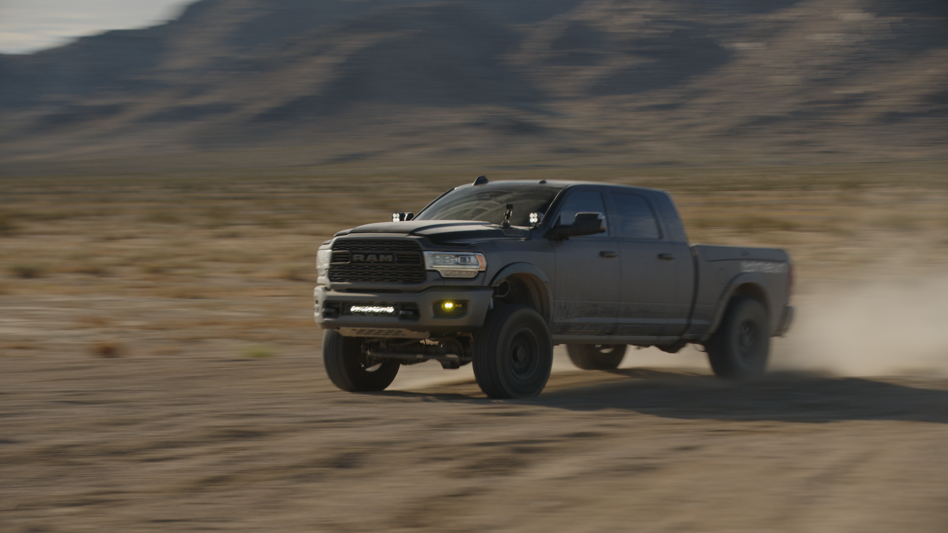 lifted RAM truck driving offroad