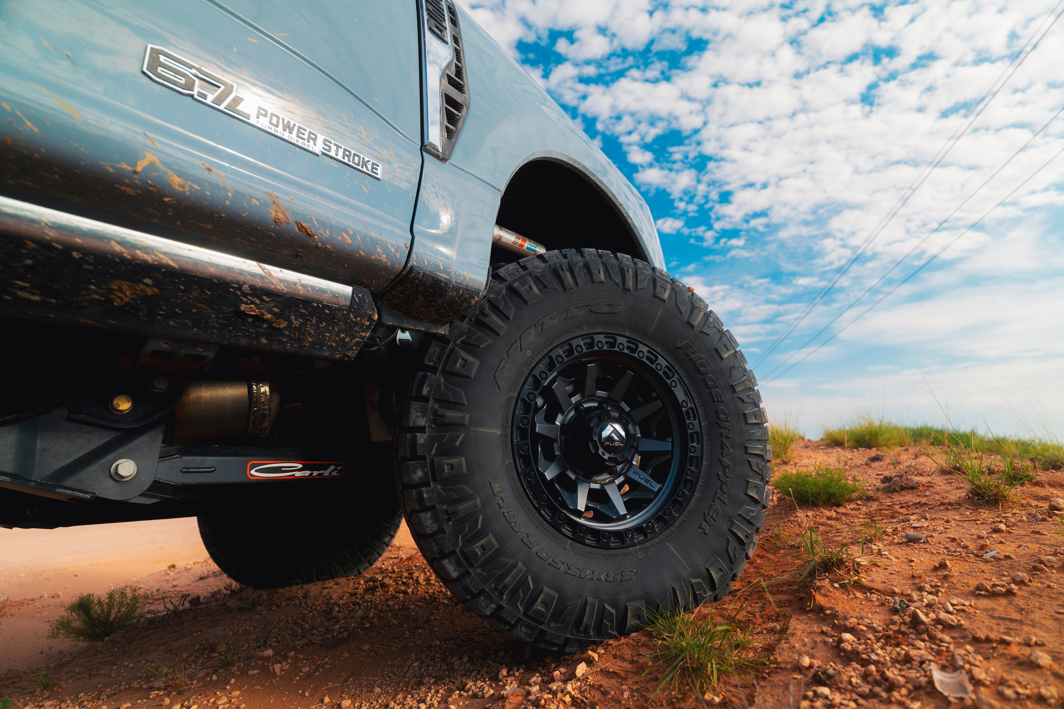 custom wheel and tires for lifted truck
